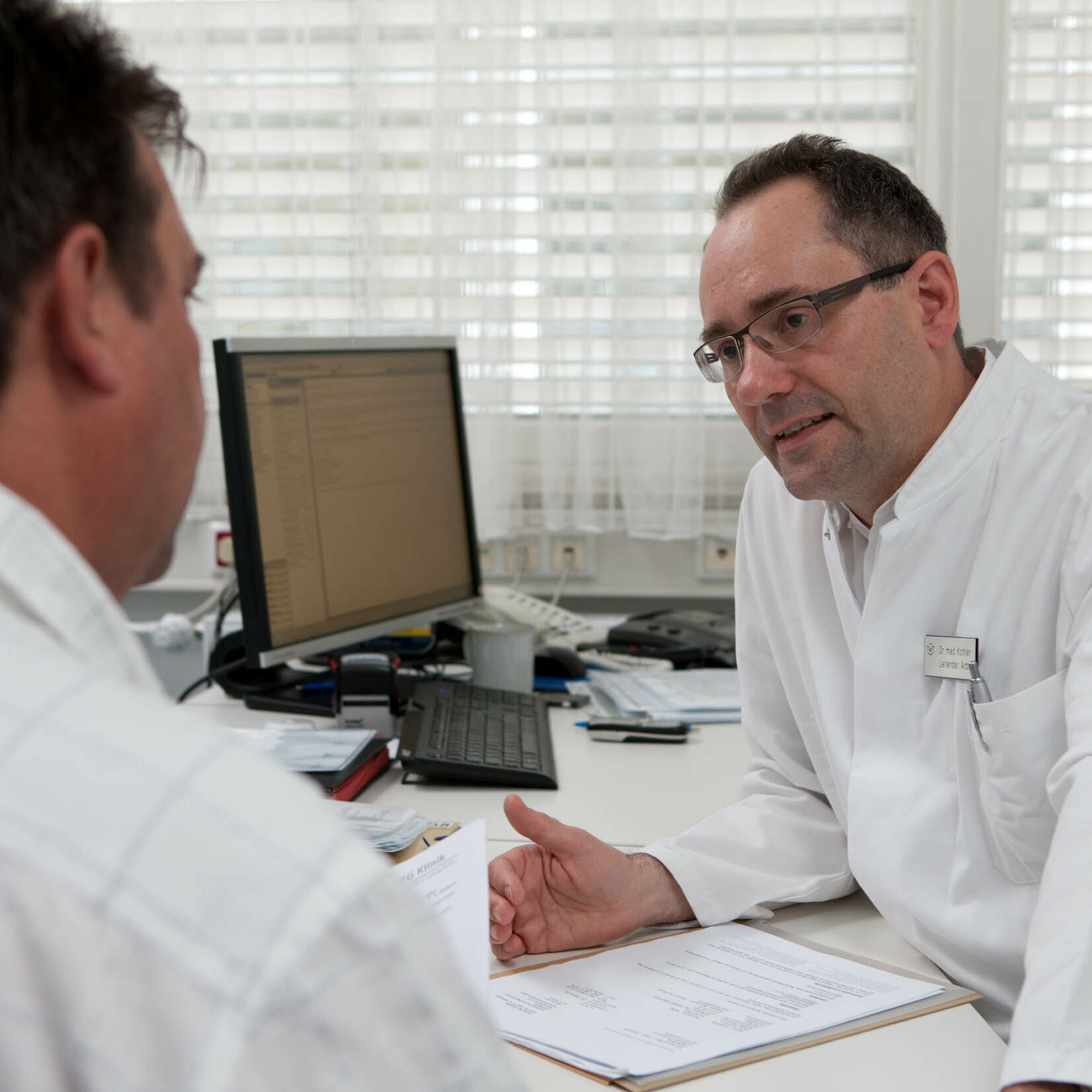 Reha-Gespräch Arzt Patient Reha Manager