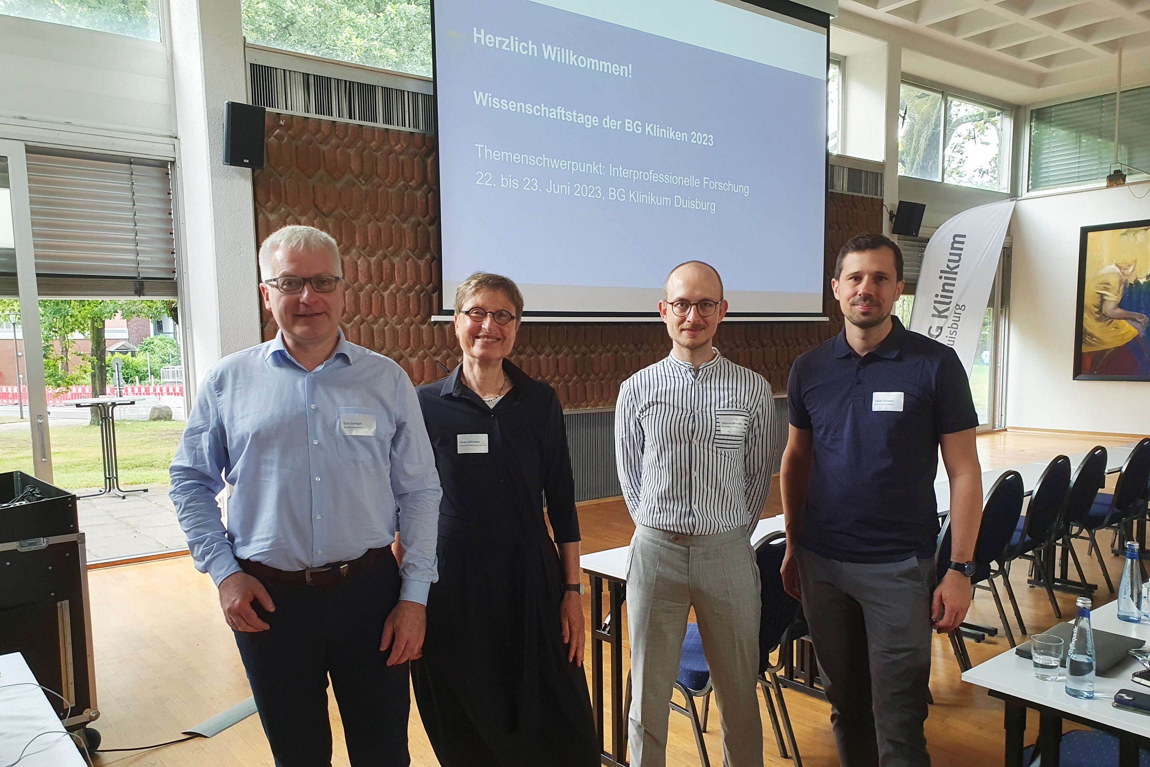 Die Organisatoren Prof. Dr. med. Dirk Stengel und Dr. rer. nat. Tobias Ohmann, Referentin Univ.-Prof. Dr. Ulrike Höhmann von der Universität Witten/Herdecke, Johannes Wünscher, Referent Pflege im Resort Medizin der BG Kliniken.